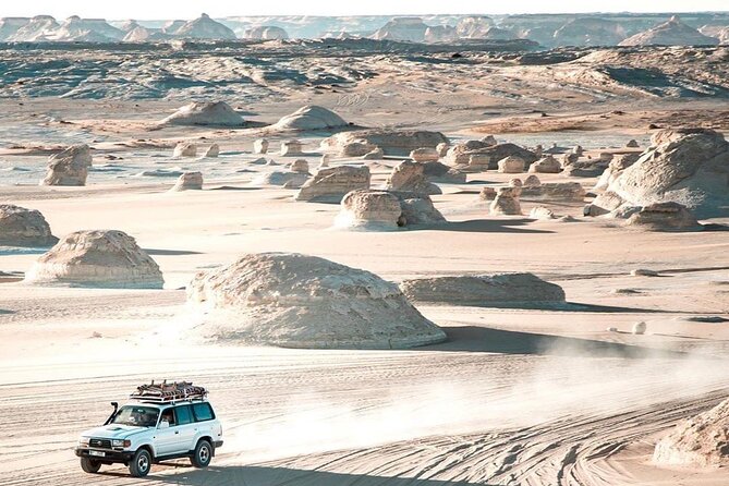 2-Day Black & White Desert, Crystal Mountain, option Pyramid tour - Day 2 Sunrise And Bahariya Oasis Stops: English Mountain, Salt Lake At Bawiti, Then Back To Cairo