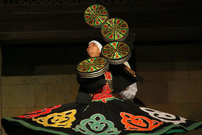 Al Tannoura Egyptian Dance Heritage Show at Wekalet El Ghouri - What the evening feels like: volume, crowd energy, and comfort