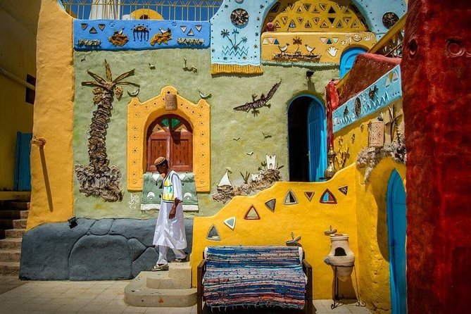 Aswan: Private Tour to Philae Temple and Nubian Village By Boat & Entrance Fees - Nubian village life: colorful homes and real conversation