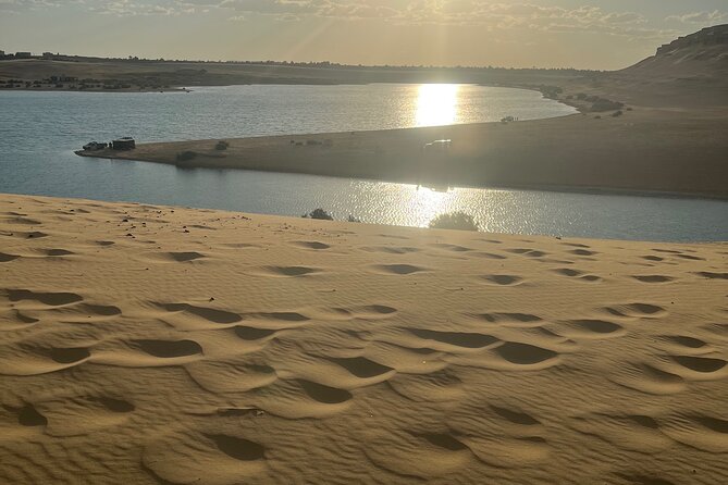 Cairo. Fayum Oasis 4<em>4 Desert Safari, Sand Surf ,Waterfall Tour – Key Things to Know Before You Go’ /></p>
<ul>
<li><strong>Hotel pickup at 07:00 AM</strong> from Cairo or Giza, with an air-conditioned drive</li>
<li><strong>Wadi El Rayan waterfalls</strong> inside the desert, with photo-friendly views</li>
<li><strong>Qarun Lake stop</strong> at an old natural-lake setting, plus salt-lake viewpoints</li>
<li><strong>4×4 dune bashing on soft yellow sand</strong> as the main thrill</li>
<li><strong>Sand boarding session</strong> included, plus time around dunes and Magic Lake</li>
<li><strong>Private tour for your group</strong> with lunch, bottled water, and all fees and taxes included</li>
</ul>
<h2 id="first-hour-cairo-pickup-to-wadi-el-rayan-desert">First Hour: Cairo Pickup to Wadi El Rayan Desert</h2>
<p>4 Desert Safari, Sand Surf ,Waterfall Tour – First Hour: Cairo Pickup to Wadi El Rayan Desert’ /><br />
The day starts early, with pickup from your hotel in Cairo or Giza at <strong>07:00 AM</strong>. You then drive toward El Fayoum, with the ride taking around an hour to about an hour and a half depending on traffic and your exact pickup point.</p>
<p><p>This is where the comfort matters. You are in an air-conditioned vehicle, and you have <strong>bottled water</strong> included for the day, which makes it easier to keep moving once you switch from paved roads to desert roads.</p>
</p>
<p><p>One practical note: you should plan to be patient. The tour duration is about <strong>9 hours</strong>, and the “extra” time is travel, not extra stops. If you hate long transit days, this might feel like too much.</p>
</p>
<div class="twil" style="margin: 20px 0; padding: 15px 0;"><p>More Quad & Desert Safaris in Cairo</p><ul style="margin: 10px 0; padding-left: 0; list-style: none;"><li style="margin: 0 0 12px 0; padding: 0 0 12px 0; border-bottom: 1px solid #eee; line-height: 1.4;"><a href="https://egyptianinsider.com/from-cairo-desert-safari-camel-ride-magic-lake-lunch/">From Cairo: Desert Safari, Camel Ride, Magic Lake, & Lunch</a><br><span style="font-size: 0.82em; color: #555;"><span style="color: #B08D2F;">★</span> 4.9 &nbsp;&middot;&nbsp; 1,273 reviews</span></li><li style="margin: 0 0 12px 0; padding: 0 0 12px 0; border-bottom: 1px solid #eee; line-height: 1.4;"><a href="https://egyptianinsider.com/giza-pyramids-sphinx-atv-bike-lunchcamel-ride-dinner-cruise-shopping-tour/">Giza pyramids, Sphinx, ATV bike, Lunch,Camel ride, Dinner cruise& shopping tour</a><br><span style="font-size: 0.82em; color: #555;"><span style="color: #B08D2F;">★</span> 5.0 &nbsp;&middot;&nbsp; 798 reviews</span></li><li style="margin: 0; padding: 0; border-bottom: none; line-height: 1.4;"><a href="https://egyptianinsider.com/vip-giza-pyramidssphinxatv-bikecamelrideshoppingdinnercruise/">VIP Giza Pyramids,Sphinx,ATV bike,CamelRide,Shopping&DinnerCruise</a><br><span style="font-size: 0.82em; color: #555;"><span style="color: #B08D2F;">★</span> 5.0 &nbsp;&middot;&nbsp; 704 reviews</span></li></ul></div><h2 id="fayoum-oasis-stops-salt-lake-views-and-photo-breaks">Fayoum Oasis Stops: Salt-Lake Views and Photo Breaks</h2>
<p><img width="669" height="446" decoding="async" src=