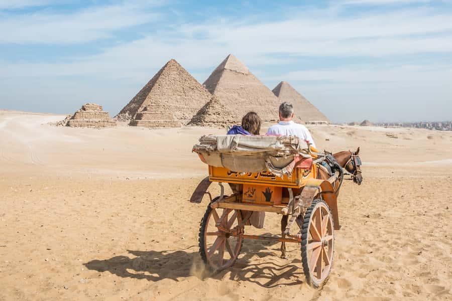 Cairo: Half Day Pyramids Tour by Camel or Horse Carriage - Logistics that affect your comfort: pickup areas, vehicle comfort, and what to bring