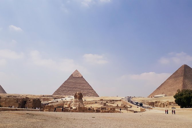 Cairo Layover Tours to Giza Pyramids Egyptian Museum & Bazaar - Khan el-Khalili hour: souvenirs, crafts, and Cairo street rhythm