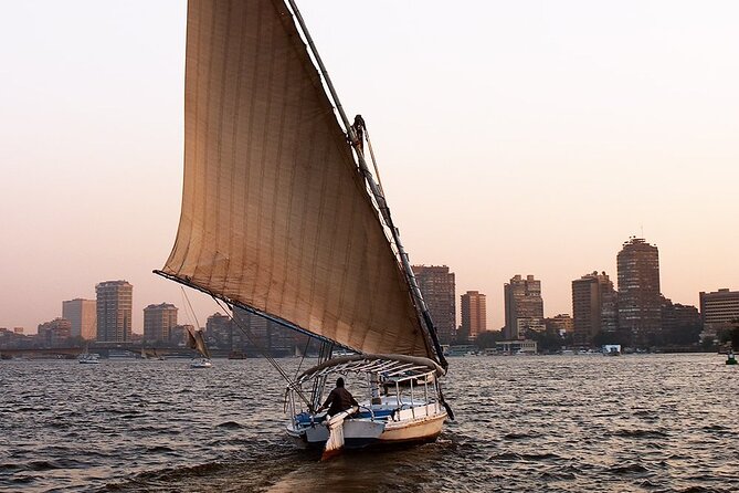 Cairo sailing boat Tours on the Nile by felucca - Felucca-style sailing and the city skyline from the water
