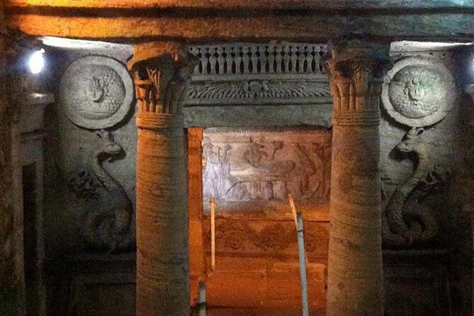 Day Trip to Alexandria from Giza & Cairo by Pharaohs Tours - Kom el Shuqaffa Catacombs: spiral staircase burial art