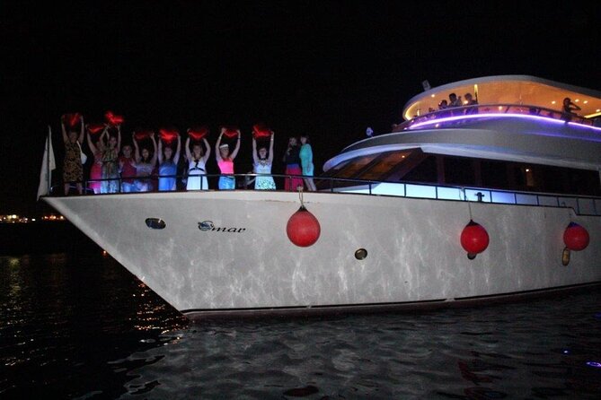 Dinner Cruise Full party & Show & Belly dancer in Sharm El Sheikh - The yacht at night: lights, music, and the Red Sea feel