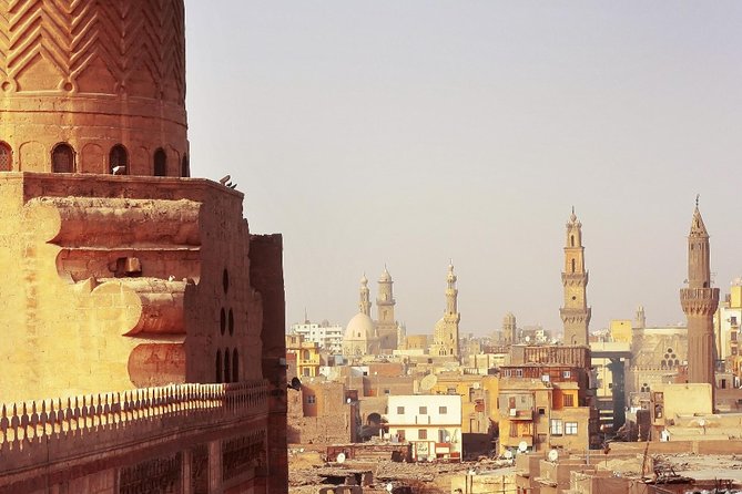 Downtown Cairo Half-Day Tour with Egyptian Dinner - Zamalek on Gezira Island: streets, Old Opera Square, and Attabah area wandering