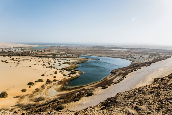 From Cairo: Desert Safari, Waterfalls, Sand boarding and Camel ride with Lunch - Dune bashing on a 4x4 Land Cruiser: the adrenaline section