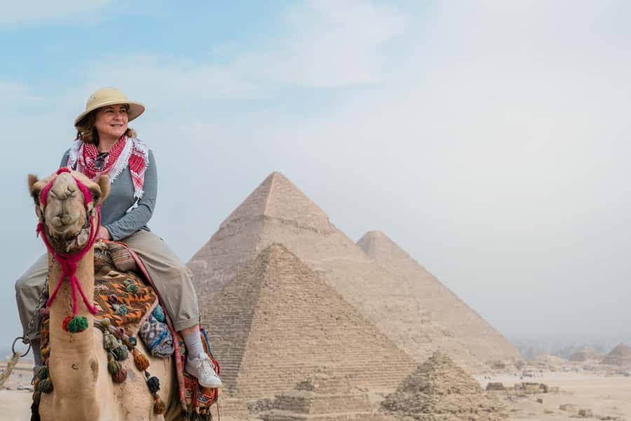 From Hurghada: Cairo Private Day Tour with Flights & Lunch - The Giza stops: Pyramids and Sphinx with a guide who explains