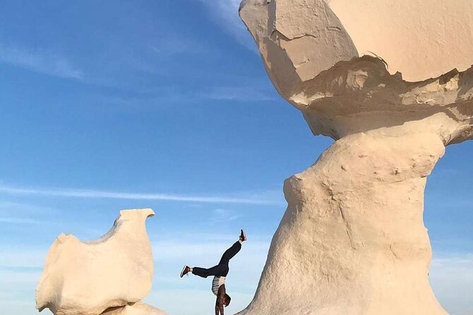 Full Day Private Bahariya Oasis and White Desert Tour from Cairo - Black Desert route: volcanic craters, crystals, and dune surfing energy