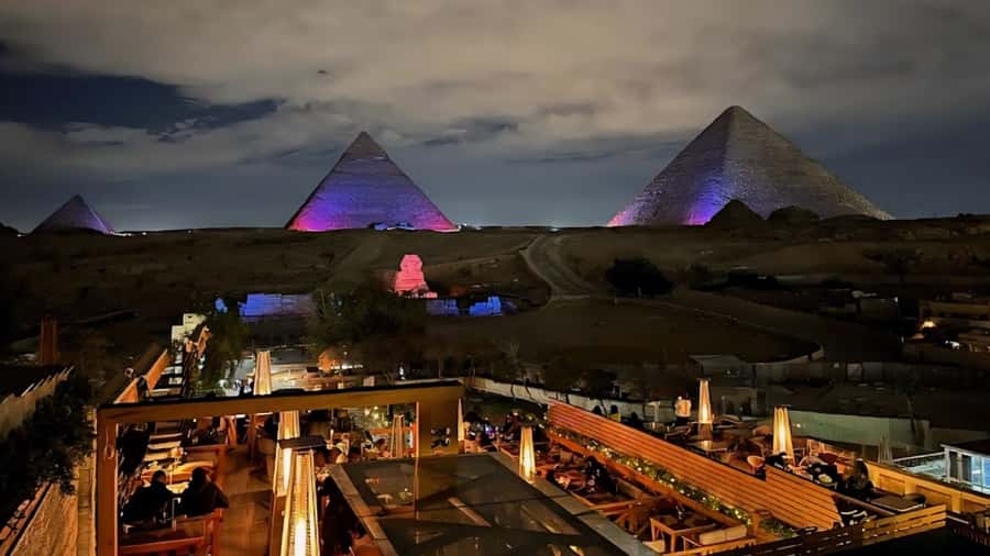 Giza: Dinner with Pyramids All Around You at Rooftop7000 - The Great Pyramid Inn dinner, live entertainment, and rooftop views