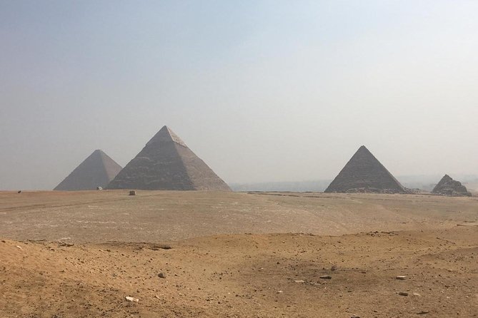 Giza Pyramids and Sphinx: Guided Day Tour from Cairo - Hotel Pickup, AC Transport, and the Right Pace From Cairo