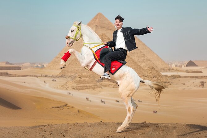 Giza Pyramids Photoshoot with Jumping Horse, Camel and Sphinx - Stop 2: Panoramic Pyramids view plus camel ride and jumping horse