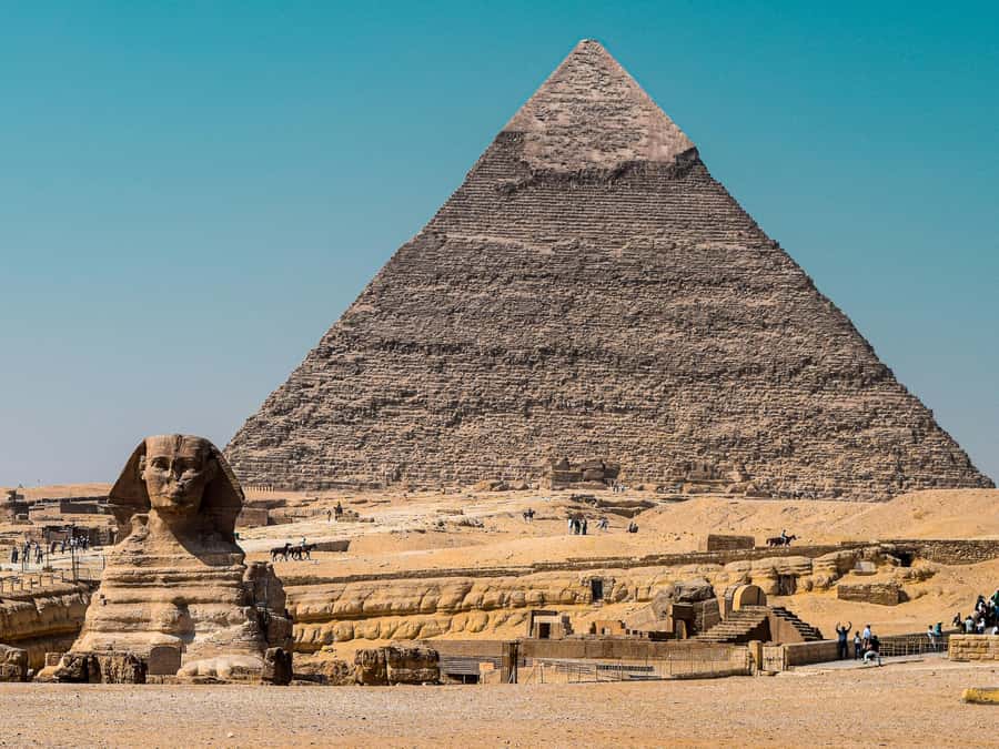 Giza Sunrise Pyramid Guided Tour With Camel Ride & Breakfast - The 2-hour guided walk that turns stone into a story