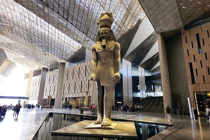 Grand Egyptian Museum, Grand staircase, New Galleries, and lunch. - Ramses II in the open court, obelisks, and courtyard giants