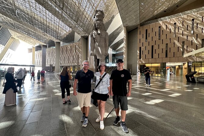 Grand Egyptian Museum, Grand staircase, New Galleries & lunch - Grand Staircase: the pyramid view and a lineup of royal statues