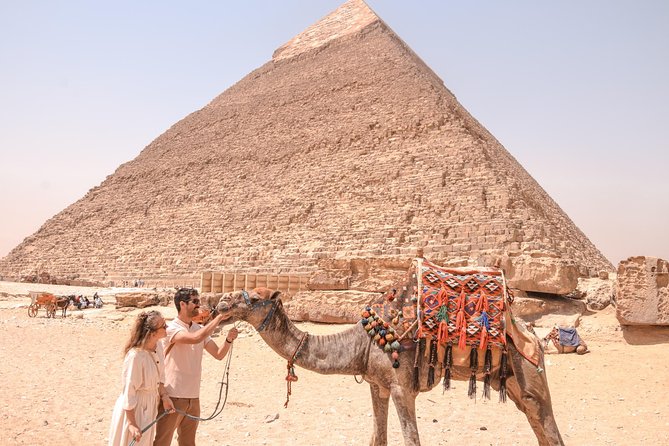 Half day Guided tour to Giza pyramids Sphinx with 1 Hour Camel ride - Khafre’s Pyramid complex: Valley Temple and statues your guide points out