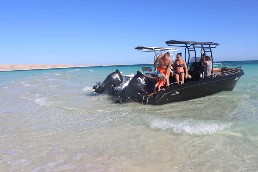 Hurghada: 4 Island Hopping Tour Dolphin, Snorkeling & Lunch - Snorkeling stops and what you might see on the reefs