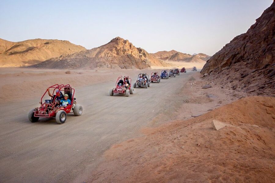 Hurghada: Desert Quad Bike and Buggy Adventure with Transfer - BBQ dinner, Tanura, belly dancing, and the night show energy