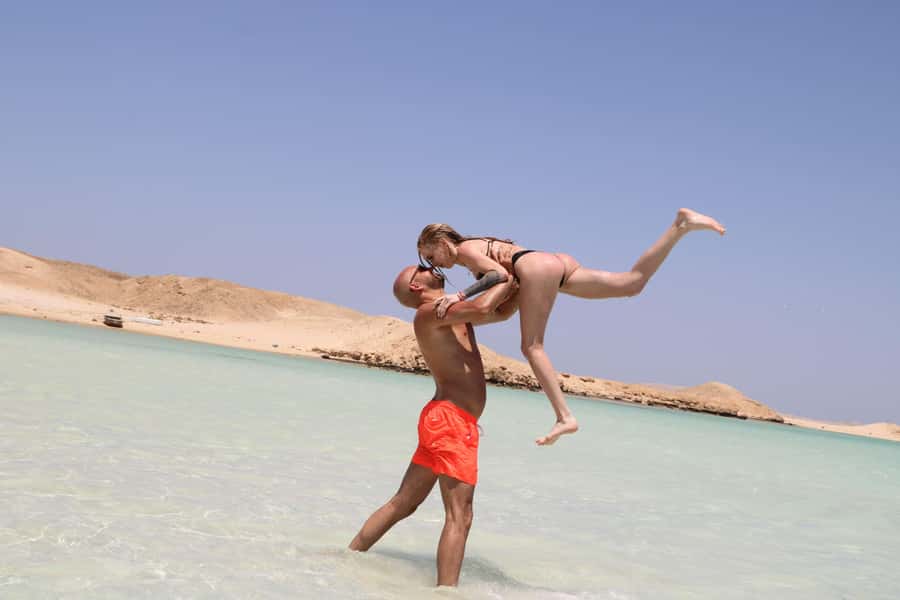 Hurghada: Orange Bay Island with breakfast, lunch & watersports - Banana boat and sofa rides: water fun after snorkeling