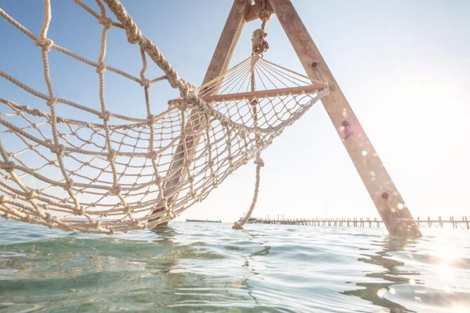 Hurghada: Orange Bay, Snorkeling, Watersports, Lunch & Drinks - Pickup, Breakfast Sandwich, and Getting Set for Water Time