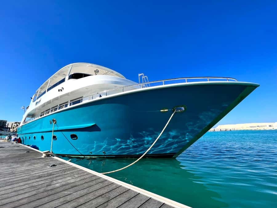 Hurghada: Orange & Giftun Island Cruise with Massage & Lunch - Yacht Travel Time: Comfortable Sailing, Then Island Time
