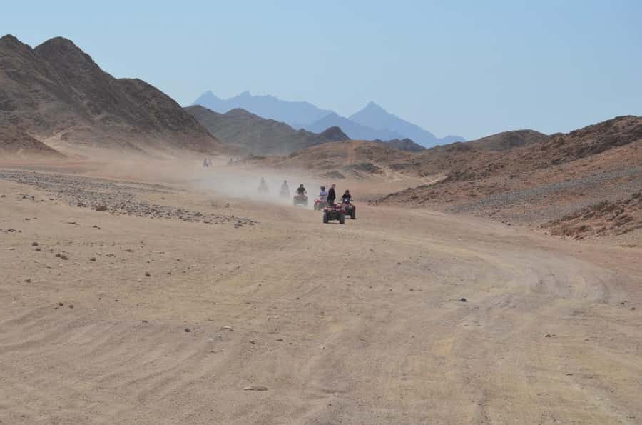 Hurghada: Red Sea Desert Quad Biking Tour & Sand Mountain - Sand mountain tea break and the climb for photos