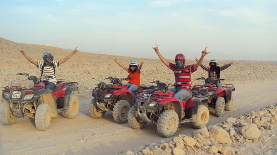 Morning Trip: Desert Safari Riding a Speed Quad Bike, Pickup - The Quad Test Station: Briefing, Scarf, and Shade Reality