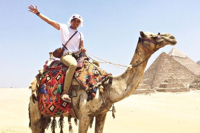 Private Full day Tour to Giza Pyramids Sakkara and Memphis - Stop 2: Saqqara (Sakkara) Pyramids, Step Pyramid, and a statue photo stop