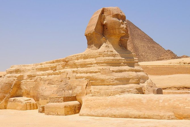 Private Guided Day Tour in Giza Saqqara and the Egyptian Museum Including a Camel Ride from Cairo - Giza pyramids and the Sphinx, with a 25-minute camel ride