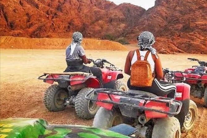 Sharm: Quad Bike or Car Buggy, Camel ride & optional VIP Bedouin Dinner & Show - Mountain photo stop and the eco-sound moment