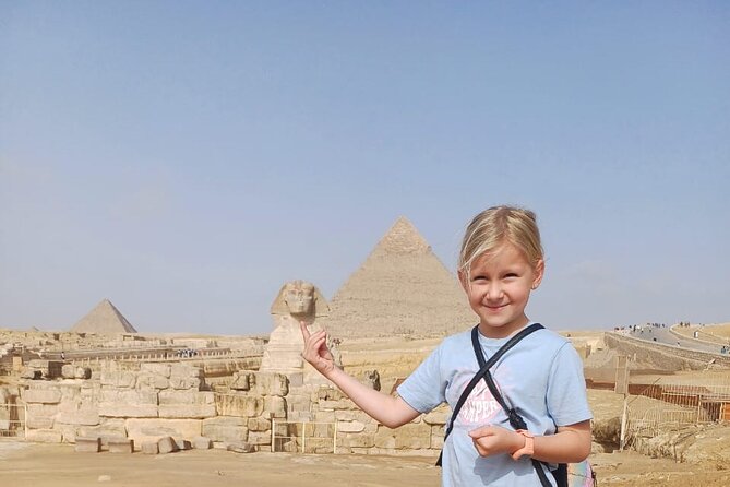 The Giza Pyramids, the Great Sphinx, and Local Lunch. - Panorama stop with the three pyramids in view and the camel option