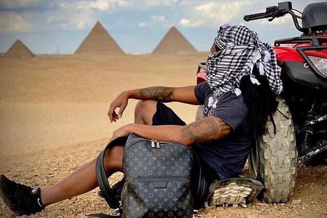 Top Tour Giza Pyramids ,Sphinx ,camel ride and ATV safari - Stop 2 near the Great Pyramid of Cheops: panorama views and a camel ride